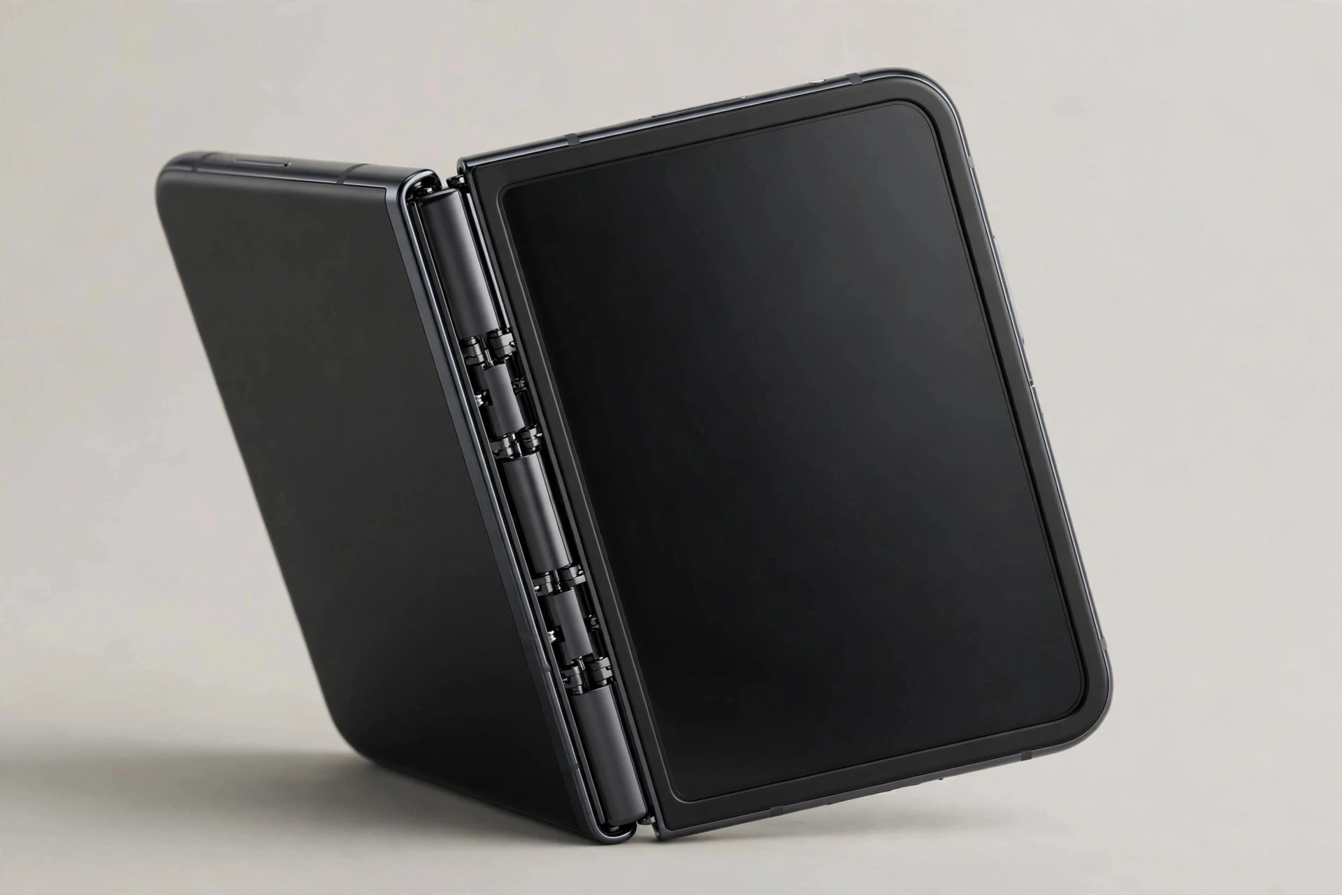 Foldable smartphone half-open showing its inner display and hinge